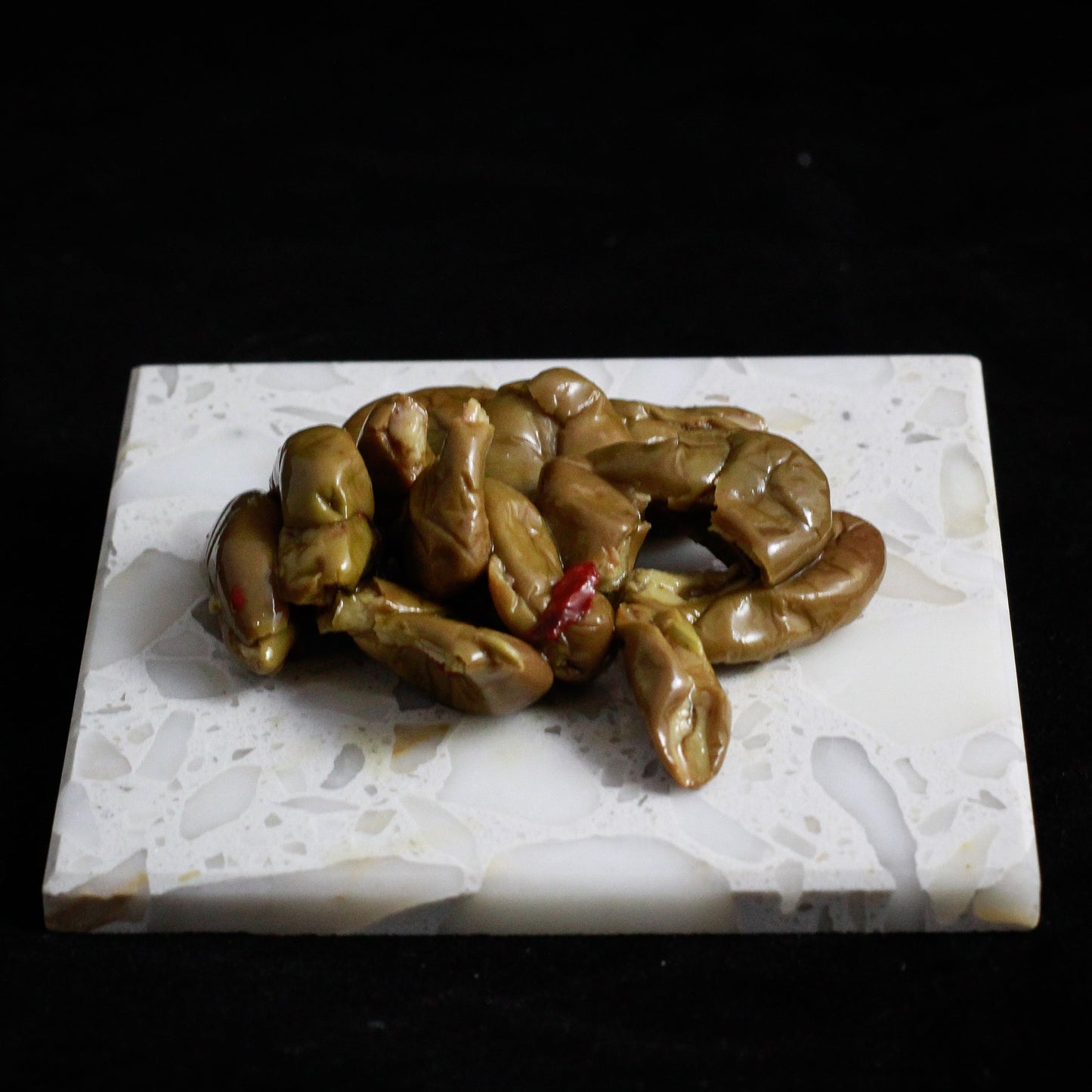 Zerkleinerte entkernte Oliven